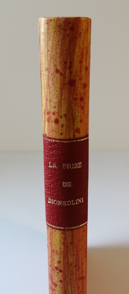 La Prise de Dionkoloni - Classiques Africains - Bradel plein papier - Papier artisanal - Pièce de titre cuir - Atelier de Reliure à Fleur de Pages